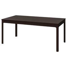 a wooden table with two legs and a brown top on a white background in front of a white backdrop