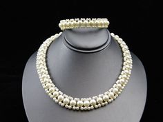 "This is a beautiful, unusual, faux pearl necklace and earring set in a creamy white color. The necklace has a lobster claw clasp with a tag stamped SHB and the bracelet is stretchy. It is in very nice vintage preowned condition. The necklace length is 24\" and the bracelet is 7\" but stretches. All measurements are approximate. Please refer to the photos as they are and integral part of the description. Be sure to contact us with questions prior to purchasing. Due to differences in screen setti Pearl Necklace And Earring Set, Cream Necklace, Necklace And Bracelet, Necklace And Earring Set, Faux Pearl Necklace, Pretty Earrings, Acrylic Earrings, Creamy White, Necklace Length