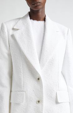 Part of D&G's Capri collection celebrating summers in '60s Italy, this optic-white single-breasted blazer is tailored from richly textured cotton-forward tweed. Front button closure Notched lapels Four-button cuffs Chest welt pocket; front flap pockets Silk lining 80% cotton, 15% linen, 5% nylon Dry clean Made in Italy Designer Clothing Designer White Spring Blazer, Fitted White Tweed Blazer, Designer White Blazer For Spring, White Designer Blazer For Spring, Designer White Blazer For Fall, Modern White Blazer, Luxury White Blazer For Spring, Timeless White Blazer For Fall, Luxury White Blazer With Structured Boning