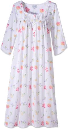 This fresh floral-print nightgown is one of the softest and silkiest we've ever seen from Lanz. The cotton is finely woven and the flattering silhouette is detailed with gentle gathers at the bodice, pearlized buttons, 3/4 sleeves, and lace and beaded ribbon trim. Silky soft knit nightgown3/4 sleevesButton-front placketFlowing silhouetteNeckline runs wideApprox. 50" long100% cotton knitMachine wash and dryImported Cotton Night Dress, Cotton Nighties, Night Gown Dress, Vermont Country Store, Plus Size Sleepwear, Cotton Nightgown, Night Dress For Women, Dress Indian Style, Nightgowns For Women