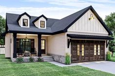 a small house with a porch and two garages