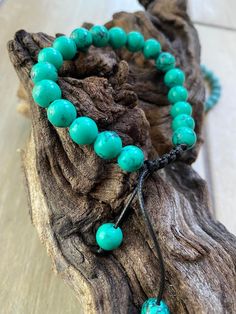 Beautiful Pine Stone bracelets. Smallest adjusted size -14cm circumference. Offered In 2 colors-teal/ darker turquoise and light turquoise. Personalisation is optional-stainless steel initials (in the picture). Gift Wrapping available for additional $1.85 Please click here: https://www.etsy.com/listing/1345522559/gift-wrapping-options?ref=listing_published_alert Adjustable Turquoise Friendship Bracelet Gift, Adjustable Turquoise Friendship Bracelets For Gifts, Turquoise Adjustable Cord Friendship Bracelets, Turquoise Adjustable Friendship Bracelet, Turquoise Adjustable Friendship Bracelets, Adjustable Turquoise Friendship Bracelets With Sliding Knot, Adjustable Turquoise Friendship Bracelet, Adjustable Turquoise Bracelet With Sliding Knot, Adjustable Turquoise Friendship Bracelets