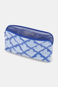 With motifs that are feminine and understated, it's no wonder the Jemina print is a classic in our Core collection. If you have a passion for travel, this makeup bag is the perfect companion on all of your journeys. Materials and Care 100% Cotton Canvas with Protective Poly Coating Water-Resistant Wipe Clean Imported Measurement Information Small: 8" W, 4.75" H, 2.5" D Large: 10.5" W x 6.25" H, 3.25" D Blue Pouch Cosmetic Bag For On-the-go, Rectangular Zipper Pouch Travel Case, Travel Rectangular Zipper Cosmetic Bag, Blue Rectangular Case Bag For Daily Use, Blue Rectangular Daily Use Bag, Blue Rectangular Cosmetic Bag For Everyday Use, Blue Rectangular Cosmetic Bag For Daily Use, Blue On-the-go Pouch Cosmetic Bag, Blue Rectangular Cosmetic Bag