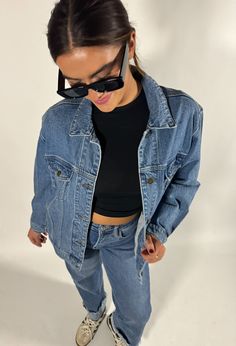 Cozy up for fall in this vintage-inspired oversize jacket. Featuring a slightly worn feel, this jacket is a medium wash to fit all of your aesthetics. 99% Cotton, 1% Spandex Model is wearing size Small Distressed Denim Blue Outerwear For Fall, Trendy Faded Denim Jacket For Fall, Everyday Washed Denim Jacket For Fall, Everyday Winter Washed Outerwear, Fall Streetwear Medium Wash Denim Jacket, Retro Dark Wash Relaxed Fit Outerwear, Medium Wash Denim Jacket For Fall Streetwear, Casual Washed Blue Denim Jacket For Fall, Relaxed Fit Grunge Denim Jacket For Fall