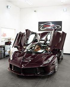 a very nice looking sports car in a showroom