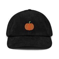 Stay warm and stylish this fall with our cozy corduroy hat featuring an adorable pumpkin design! Available in four beautiful colors, this hat is the perfect addition to any autumn outfit. The adjustable strap ensures a comfortable and secure fit for any head size. Whether you're out pumpkin picking or enjoying a cozy night by the fire, this hat is sure to keep you feeling snug and looking great! * 100% cotton corduroy * Soft, unstructured crown * Cotton twill sweatband and taping * Adjustable bu Casual Black Corduroy Hat, Winter Corduroy Adjustable Hat, Casual Halloween Beanie Hat, Adjustable Corduroy Six-panel Hat, Corduroy Hats, Thanksgiving Hat, Fall Hat, Corduroy Hat, Pumpkin Gift