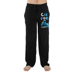 Cuddle up on the couch with the Cookie Monster in these Sesame Street sleep pants. These PJs feature highly detailed artwork of the Cookie Monster and a text design which displays one of the character?s signature quotes. The elastic waistband perfectly conforms to your waist. Find a comfortable fit with the adjustable drawstring. These Sesame Street Sleep Pants are also made from a poly-cotton blended fabric that delivers superior softness and long-lasting comfort. Make these Sesame Street Sleep Relaxed Fit Cotton Pants For Sleepover, Black Cotton Sleep Pants, Cotton Sweatpants With Elastic Waistband For Sleepover, Casual Black Bottoms For Bedtime, Black Casual Bedtime Bottoms, Casual Character Print Loungewear Bottoms, Casual Loungewear Bottoms With Character Print, Cotton Bottoms With Character Print For Pajama Party, Cotton Sleepwear With Letter Print In Relaxed Fit