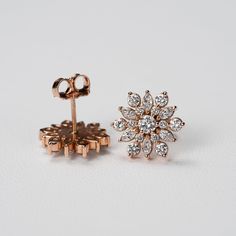 Our antique-inspired diamond cluster flower earrings are delicate and charming and reminiscent of days gone by. Pair it with the matching ring and necklace for a very feminine and romantic bridal look. Prefer these earrings set with colored gemstones? Contact us for a quote: http://etsy.me/1231fkN Matching ring: https://etsy.me/2HEQYYe Matching necklace: https://etsy.me/2WlOxgy Details: - 14k rose, yellow, white gold or platinum. - Diamond flowers are 12mm x 11mm. - SI+G diamonds - 1 CTW. - High Yellow Gold Flower Diamond Earrings For Wedding, Wedding Flower-shaped Diamond Earrings With Single Cut Diamonds, Wedding Flower-shaped Diamond Earrings, Luxury Flower Shaped Diamond Wedding Earrings, Luxury Diamond Flower Shape Earrings For Wedding, Luxury Diamond Flower-shaped Earrings For Wedding, Luxury Flower Shape Diamond Earrings For Wedding, Luxury Flower-shaped Diamond Earrings For Wedding, Timeless Diamond Cluster Earrings For Gift