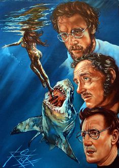 two men and a shark in the water