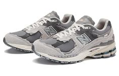 The New Balance 2002R 'Rain Cloud' is a greyscale take on a classic lifestyle runner. The breathable mesh upper is reinforced with raw-edged suede overlays, giving the impression that the material has eroded over time. An exposed foam tongue adds to the shoe's deconstructed aesthetic, while lightweight cushioning and improved impact protection make it perfect for any activity. Raw Effect, New Balance 2002r Protection Pack, 2002r Protection Pack, Classic Lifestyle, New Balance 2002r, Rain Cloud, Gray Matters, Rain Clouds, Color Games