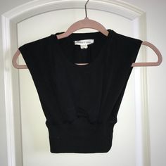 Never Worn Chic Urban Outfitters Tops For Night Out, Urban Outfitters Sleeveless Black Crop Top, Urban Outfitters Black Casual Tops, Black Crop Top For Day Out, Black Cropped Tops By Urban Outfitters, Black Cropped Top From Urban Outfitters, Fitted Black Crop Top By Urban Outfitters, Urban Outfitters Black Crop Top For Summer, Chic Stretch Tops From Urban Outfitters