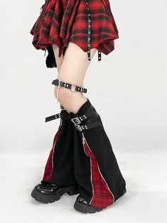 This pair of leg warmers features a unique zipper closure design. When unzipped, they reveal a striking red plaid pattern, adding a touch of flair and creativity to your outfit. The leg warmers are adorned with buckle strap decorations, further enhancing their stylish appeal.  Please note that the price includes one pair of leg warmers. Punk Bottoms With Zipper Closure For Fall, Punk Style Bottoms With Zip Fly For Fall, Fall Punk Bottoms With Zipper Closure, Edgy Winter Bottoms With Zip Fly, Alternative Style Bottoms With Zipper For Fall, Alternative Style Bottoms With Zipper Closure For Fall, Trendy Bottoms With Metal Zipper For Fall, Trendy Fall Bottoms With Metal Zipper, Edgy Red Bottoms For Alternative Fashion