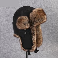 You will love this unisex bomber which is made of acrylic fibre and fur for the middle-aged youth. The Russian ushanka ear protection cap will give you great protection from cold during winter. This unisex faux trapper hat has a solid pattern and is in an all-time favorite black color with a shade of brown.

Specifications
Brand Name: GeraldBlack
Gender: Unisex
Department Name: Adult
Pattern Type: Solid
Item Type: Bomber Hats
Model Number: B-8526
Material: Fur
Applicable object: Middle age youth Russian Ushanka, Fur Trapper Hat, Fur Trapper, Ski Cap, Trapper Hat, Trapper Hats, Cap Men, Mens Workout Clothes, Ear Protection