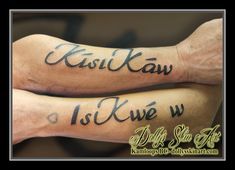 two people with tattoos on their arms and the words kisikaw is kiwe w