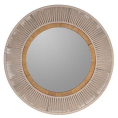 a round mirror that is made out of wood