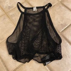 Mesh Crop Top. Never Worn. Summer Crop Top With Mesh Back, Casual Mesh Crop Top For Party, Trendy Black Crop Top For Vacation, Black Stretch Summer Crop Top, Casual Party Crop Top From Urban Outfitters, Casual Party Crop Top By Urban Outfitters, Sleeveless Crop Top With Mesh Back For Summer, Black Crop Top For Summer Night Out, Sleeveless Mesh Back Crop Top For Summer