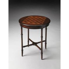 a wooden table with chess board on it's top and two legs in the middle