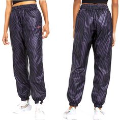 Brand New With Tags! The Nike Sportswear Icon Clash Animal Print Woven Jogger Pants With Lightweight Woven Fabric And A Fierce Animal Print Design. Lightweight, Smooth Woven Fabric With Mesh Lining Eye-Catching And On-Trend Animal Print Loose Fit Has A Spacious, Roomy Feel Elastic Waist With Adjustable Drawcord Cuffed Jogger-Style Hems 100% Polyester Machine Wash Nike Casual Purple Activewear, Casual Purple Nike Activewear, Trendy Purple Activewear For Sports, Casual Purple Gym Pants, Sporty Purple Jogging Bottoms, Purple Sporty Joggers For Sports, Sporty Purple Joggers For Sports, Casual Purple Pants With Moisture-wicking, Casual Purple Moisture-wicking Pants