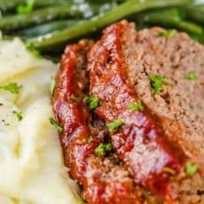 meatloaf, mashed potatoes and green beans on a plate