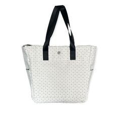 The GP On-the-go tote is inspired by the U.S. OPEN. It's the ultimate tote to be carried on and off the court. Its sleek design will make you want to take it everywhere you go. Our tote comes with a GP Silver keychain. Compact and functional, designed for comfort and elegance. There's a place for everything. Finally, keep all your things perfectly organized. Suitable for Pickleball, tennis, padel, and lifestyle. With every feature, this bag makes for a unique, modern, and essential carry-on. Fea Modern White Bags With Reinforced Handles, White Bags With Reinforced Double Handles, White Double Handle Bag With Reinforced Handles, White Bags With Reinforced Handles, Sporty Tote Shoulder Bag For Shopping, White Tote Shoulder Bag With Reinforced Handles, Functional Reversible Tote Bag, White Tote Bag With Reinforced Handles, Casual White Reversible Shoulder Bag