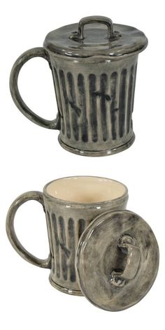 two ceramic mugs with lids and handles