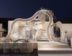 an elaborately decorated stage set for a fashion show