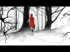 a woman in a red dress walking through the woods with trees and branches on either side