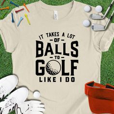 a tee shirt that says it takes a lot of balls to golf like i do