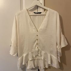 Reposhing This Item I Purchased From @_poohsposh. Loved It, But Ready To Rotate For Something New. Questions? Leave A Comment Below! White V-neck Blouse With Ruffles, Chic V-neck Blouse With Ruffle Hem, Chic White V-neck Top For Day Out, Feminine V-neck Top With Ruffle Hem, White V-neck Top With Ruffles, Spring V-neck Blouse With Ruffle Hem, V-neck Ruffle Top For Day Out, V-neck Ruffled Top For Day Out, Ruffled V-neck Top For Day Out