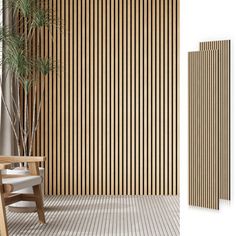 an empty chair next to a wall with vertical slatted wood panels on it