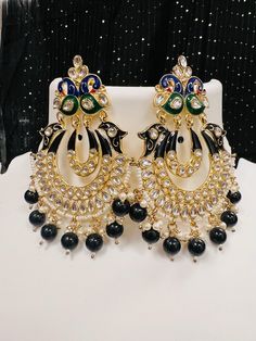 Chandbali earrings all Blouses come with margin inside for resizing / customization, please leave a message Luxury Chandbalis With Intricate Design, Luxury Chandbalis With Intricate Design For Formal Occasions, Luxury Fusion Chandbalis With Intricate Design, Luxury Meenakari Chandelier Earrings For Festive Occasions, Luxury Chandbalis With Intricate Design For Festive Occasions, Luxury Heavy Chandbalis For Festive Occasions, Luxury Multicolor Chandbali Jhumkas, Festive Chandbali Plug Earrings, Festive Chandbali Plug Earrings For Festivals