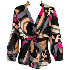 DIANE VON FURSTENBERG blouse in a multi-color silk fabric featuring an abstract print, ruched style, and V-neck.Very Good Pre-Owned Condition with Tags. Minor signs of wear. Marked: 8 Measurements: Shoulder: 15.5 inches Bust: 35 inches Sleeve: 19.5 inches Length: 24 inches Sui Generis Reference: 129756 Category: Blouse More Details Brand: DIANE VON FURSTENBERG Gender: Female Size: 8 Color: Multi-Color Fabric: Silk Pattern: Ruched Style: V-Neck Age Group: Adult Chic Multicolor Print V-neck Blouse, Multicolor Silk Top With Vibrant Print, Multicolor Silk Tops With Vibrant Print, Fitted V-neck Blouse In Multicolor Print, Multicolor Silk Blouse For Work, Chic Multicolor Abstract Print Blouse, Multicolor Abstract Print V-neck Top, Multicolor Silk Top For Work, Multicolor V-neck Workwear Blouse