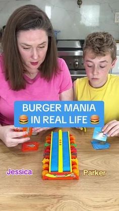 a mother and son playing with a burger mania in real life game