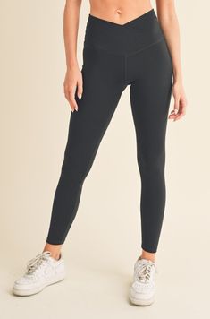 Here is a crossover leggings with eye-catching style and function! Highlight your waist with the flattering V-waistband and take on your day with confidence. A hidden phone pocket provides safe storage for all your needs!•High rise•V-waistband•Hidden phone pocket•Soft and stretchy•Full Length• ImportedComposition: 75% Nylon, 25% Spandex Mid-rise Leggings With Comfort Waistband For Workout, Compressive Leggings With Comfort Waistband, Athleisure Mid-rise Leggings With Comfort Waistband, Versatile Gym Leggings With Comfort Waistband, Versatile Leggings With Comfort Waistband For Gym, High Waist Leggings With Comfort Waistband, Black Tight Activewear With Contoured Waistband, High Waist Leggings With Comfort Waistband For Athleisure, Versatile Black Yoga Pants With Ribbed Waistband