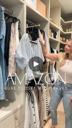 a woman standing in front of a closet filled with clothes and other clothing on shelves