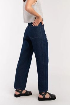 Hi-rise, relaxed fit jean with outseam piecing and slightly rounded leg shape. Jean fits true to size but you can size up for a more oversized fit. 100% Cotton Made in the USA Model wears size M Dark Indigo Jeans Outfit, Fall Wishlist, Jean Fits, Accessory Inspo, Style Guru, Indigo Jeans, Sweater Jumpsuit, Dark Indigo, Friend Outfits