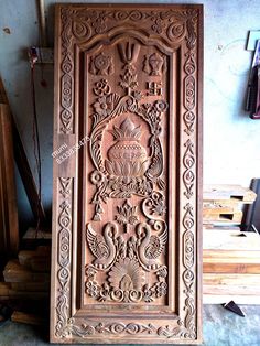 an intricately carved wooden panel in a shop