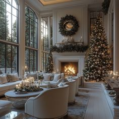 a living room filled with furniture and a christmas tree in the middle of the room