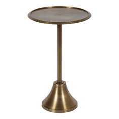 a brass metal table with a glass top on an isolated white background for use as a side table