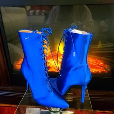 Blue Satin Lace Up Blue Pointed Toe Boots For Spring, Blue Boots For Spring Party, Blue Round Toe Heels For Winter, Blue Ankle Boot Heels For Fall, Casual Blue Heels For Winter, Casual Blue Booties For Spring, Blue High Ankle Heels For Fall, Blue Round Toe Booties For Fall, Trendy Blue Heels For Fall