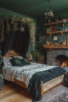 a bedroom with green walls and wood flooring has a fireplace in the corner next to it