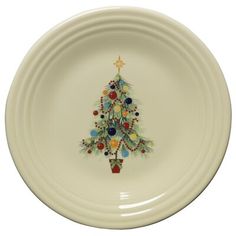 a white plate with a christmas tree painted on it