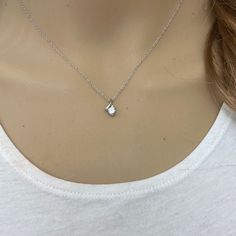 Description: 10k Solid White Gold Mini Small Cz Pendant Necklace - April Birthstone Item No.: 5252mz Metal Type: 10k White Gold Metal Color: White Gold Measurement: Stone: Cubic Zirconia Pendant W/Chain Weight: 1.4 - 1.55 Grams (Vary From Chain) Pendant : 11 X 6 Mm. Chain: 1.2 Mm Chain Available In 16", 18", 20" Brand New Dainty Crystal Diamond Necklace With Accents, Dainty Diamond White Crystal Necklace, Dainty White Diamond Crystal Necklace, Dainty White Crystal Diamond Necklace, Diamond White Topaz Necklaces For Gifts, Luxury Crystal Solitaire Necklace As Gift, Luxury Crystal Solitaire Necklace Gift, Cubic Zirconia Square Pendant Necklace For Gifting, Gift Diamond Necklace With Single Cut Crystals