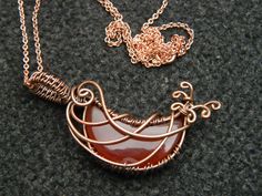 You will receive One Carnelian Moon Pendant Wire Wrapped copper pendant Gemstone Healing Jewelry Filigree Art Wire Wrap Pendant Necklace For Her Beautiful gift . Pendant Size: 43 mm long include bail. Many thanks for you visit my store ♥ if you have any question please contact us. For wholesale Price Please Convo me. You can order different items as many you like . Artisan Crescent Necklace For Gift, Orange Copper Wire Jewelry As A Gift, Orange Copper Wire Jewelry For Gifts, Unique Crescent Shaped Copper Jewelry, Copper Moon Charm For Jewelry Making, Copper Pendant Necklace With Cabochon, Crescent Copper Jewelry As Gift, Crescent Copper Jewelry Gift, Crescent Copper Jewelry For Gift