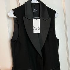 Long Zara Vest Size Xs But Fits Like A S/M Brand New With Tags Never Worn Smoke Free Home Sleeveless Black Winter Blazer, Sleeveless Black Blazer For Spring, Chic Black Sleeveless Blazer, Spring Black Tuxedo Blazer, Black Formal Vest For Spring, Black Tuxedo Blazer For Spring, Zara Fitted Vest For Workwear, Tailored Black Vest For Spring, Elegant Fitted Zara Vest