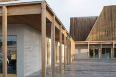 the outside of a building with wooden slats