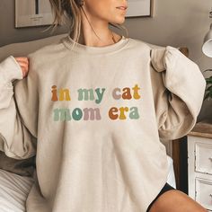 In My Cat Mom Era Shirt, Cat Mom Shirt, Cat Mom Life Shirt, Cat Mom Vibes Shirt, Cat Lover Shirt, Fur Mama Shirt, Gift For Cat Mom, Cat Tee 📢Please Check All Photos For Details.   📢Choose Your T-Shirt Size From The Drop-Down Lists Next To The item Picture   📢Choose Of Your T-Shirt Color From The 2nd Picture 🧨Please contact the store for long-sleeved shirt and sweatshirt color options. 🧨Please check which product you are paying for in the size options section, because there are different opt Gifts For Cat Owners, Fur Mama Shirt, Sugar Land Texas, Mom Vibes, Cat Mom Shirt, Cat Mom Shirts, Mom Cat, Cat Mom Gifts, Fur Mama