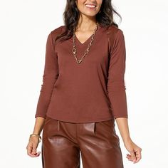 G by Giuliana G-Knit and Faux Leather Mix Top  We've paired soft & stretchy G-knit fabric with a touch of sleek & edgy faux leather trim for the richest play of textures. With a saucy V-shaped neckline and classic bracelet-length, slim-fit sleeves, this must-have top is destined to set itself (and you) apart from all your other fall and winter wardrobe faves. Tuck it into a high-waisted maxi skirt or leave it loose and hip length over your favorite denim jeans. Solid Elegant Knit Top For Fall, Chic Fall Knit Top For Everyday Wear, Chic Everyday Knit Top For Fall, Stretch Tops For Business Casual In Fall, Versatile Knit Top For Work, Knit Top For Business Casual In Fall, Fall Knit Top For Business Casual, Brown Tops For Business Casual In Fall, Chic Knit Top For Fall