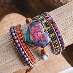 EMBRACE YOUR ARTISTIC SIDE 💗 Creativity 💗 💗 Self-expression 💗 Express your young free spirit with the Playful Bohemian Colors Apatite Stone Heart Bracelet — and add a much-welcome pop of color to your life! Apatite is a stone strongly associated with inspiration and creativity, known to boost your imagination and promote self-expression. Wear this stunning bracelet as a reminder to let your inner bohemian shine and explore your artistic side! MS-APATITE BEAUTIFUL AND UNIQUE MEANING Beautiful Bracelets Heart, Leather Wrap Bracelets, Apatite Stone, Bohemian Colors, Wrap Bracelets, Bracelet Boho, Chan Luu, Hand Chain, Stone Heart