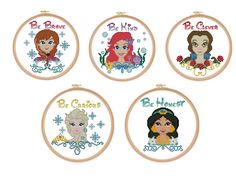 four embroidery hoops with different princesses on them